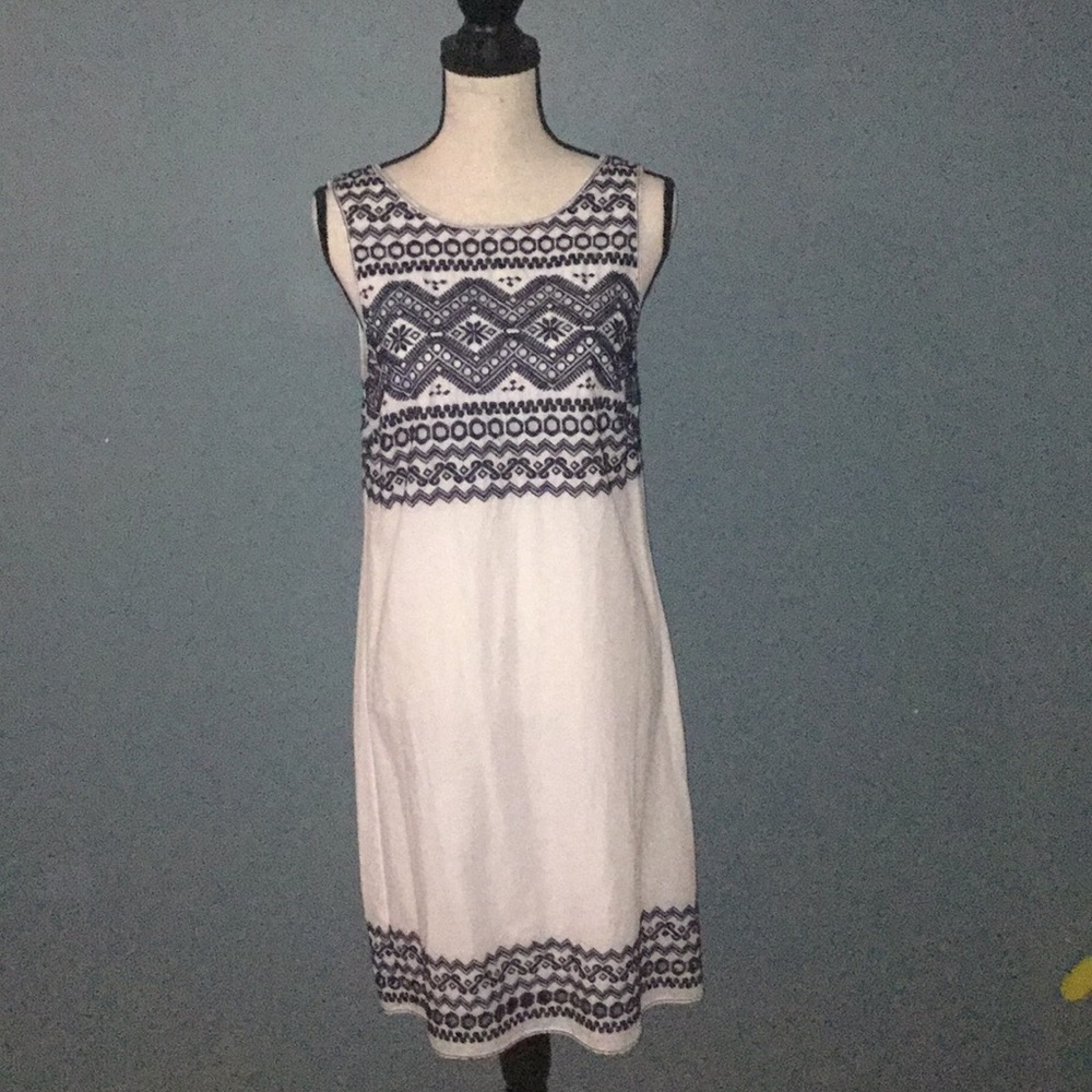 A white embroidered dress